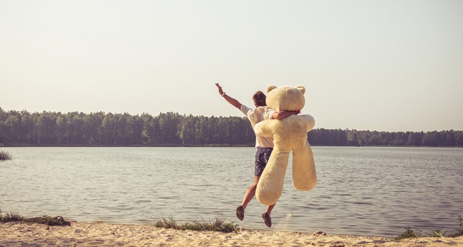 Guy with a big teddy bear