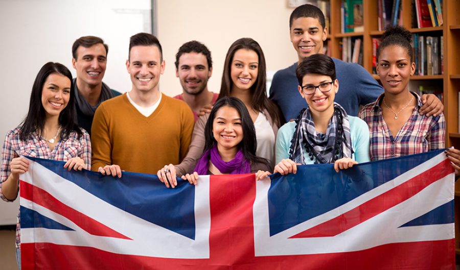 British students presenting their country with flag
